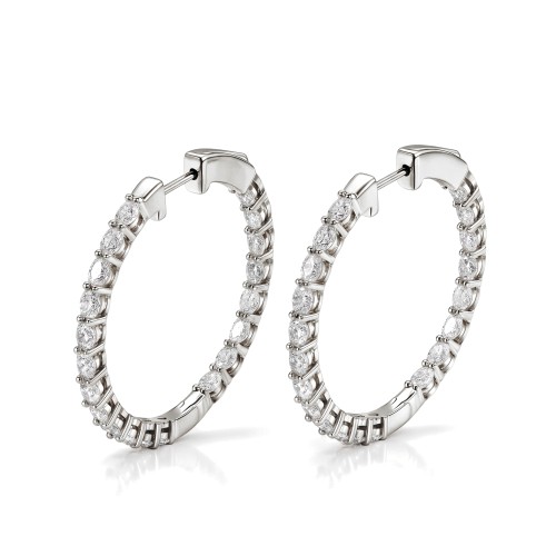 Luminette - orecchini a cerchio con moissanite di taglio ovale e incastonatura a griffe condivisa