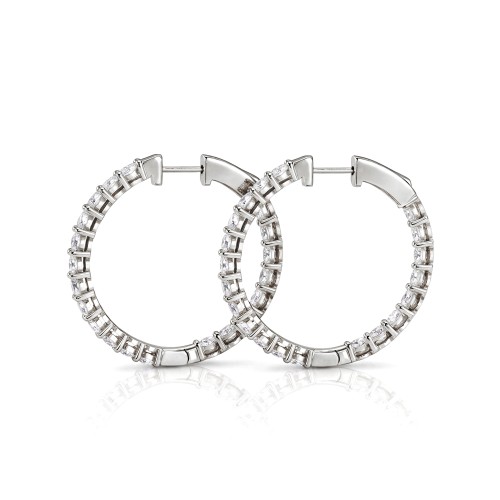 Luminette - orecchini a cerchio con moissanite di taglio ovale e incastonatura a griffe condivisa