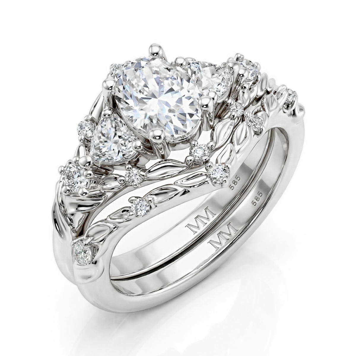 Fiorine - set nuziale con moissanite dal taglio ovale e design botanico