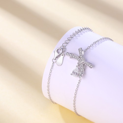 Pearlette - bracciale a fiocco con moissanite a goccia e incastonatura a pavé