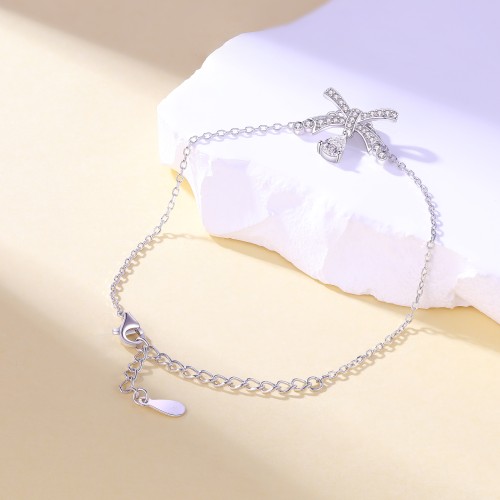 Pearlette - bracciale a fiocco con moissanite a goccia e incastonatura a pavé
