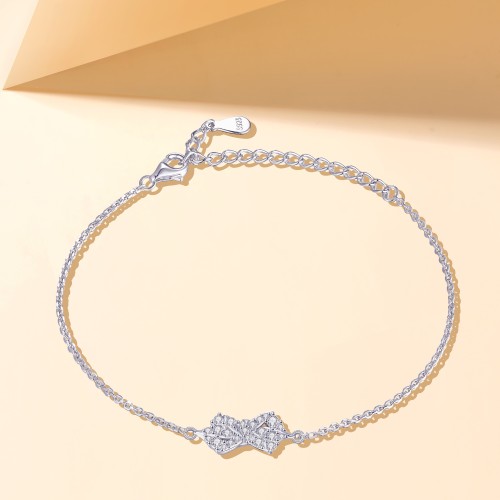 Gleamique - bracciale con motivo a fiocco impreziosito da moissanite e catena regolabile