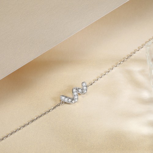 Serpentine - bracciale con moissanite e motivo a infinito, con gemme incastonate a pavé
